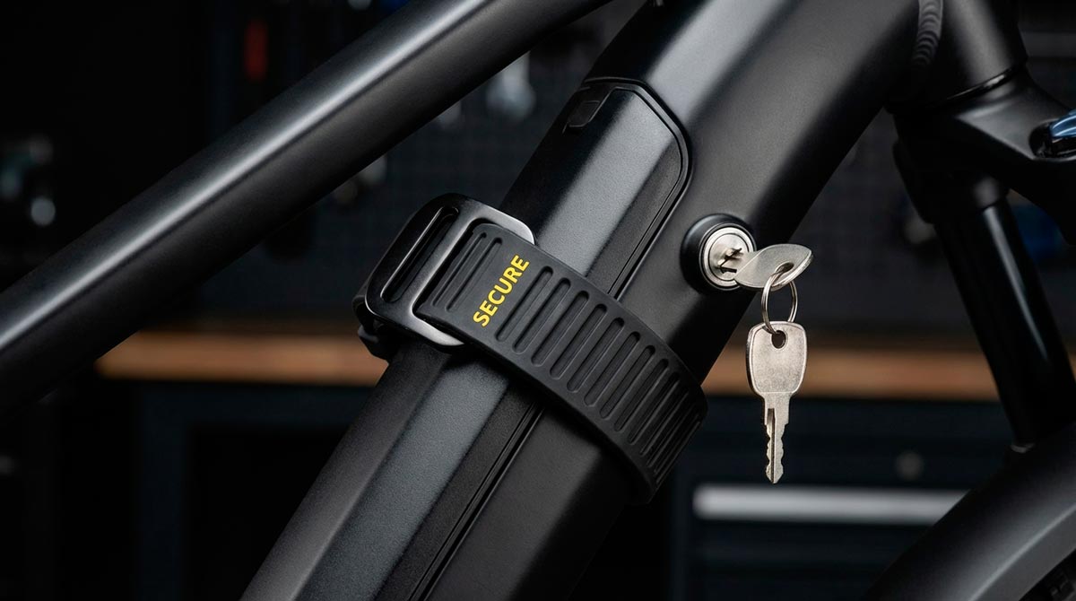 Integrated ebike battery with a secondary security strap for anti-theft