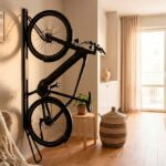 Electric bike stored vertically on a Steadyrack wall mount in a modern apartment hallway